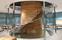 Wendeltreppe aus Stahl, Glas, Holz und spiegelpoliertem Edelstahl für Apple Central World made by seele.