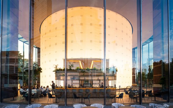 Interior glass façade backlit with full-surface LED panels for the lobby of Messeturm, made by seele.