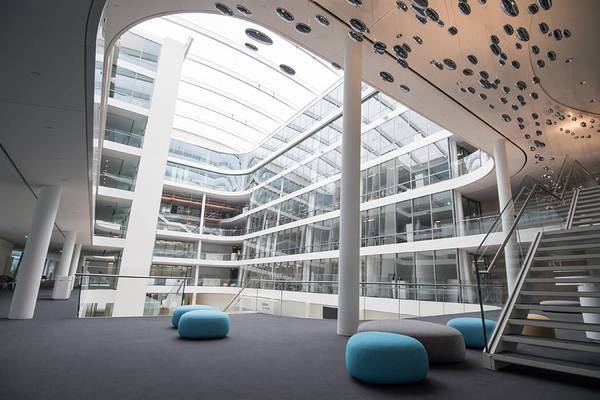 The construction of the membrane architect specialist seele covers the atrium space of the headquarters of siemens in munich.