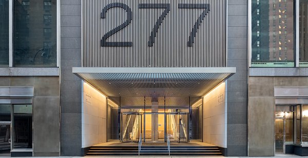 The design for the main entrance is continued for the Lexington Avenue entrance of 277 Park Avenue.