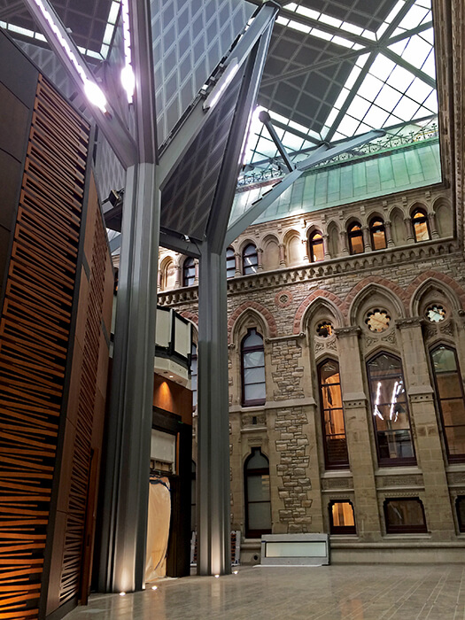A floating new roof structure in steel and glass for the West Block, Ottawa made by seele.