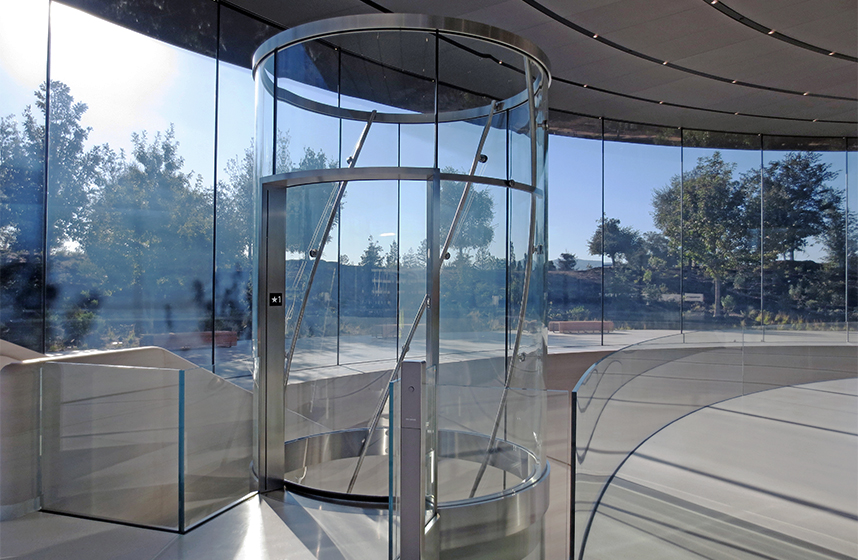 All-glass elevator and curved balustrades for Apple Park Theater in Cupertino, made by seele.